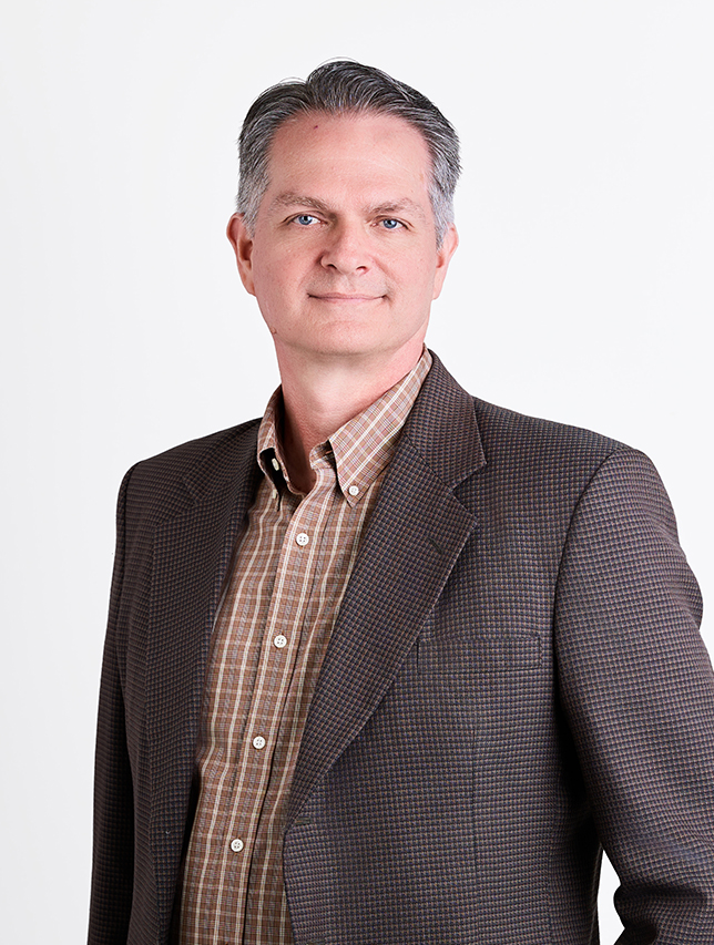 Emergent Architecture Bio Headshot Formal Neil Sutton