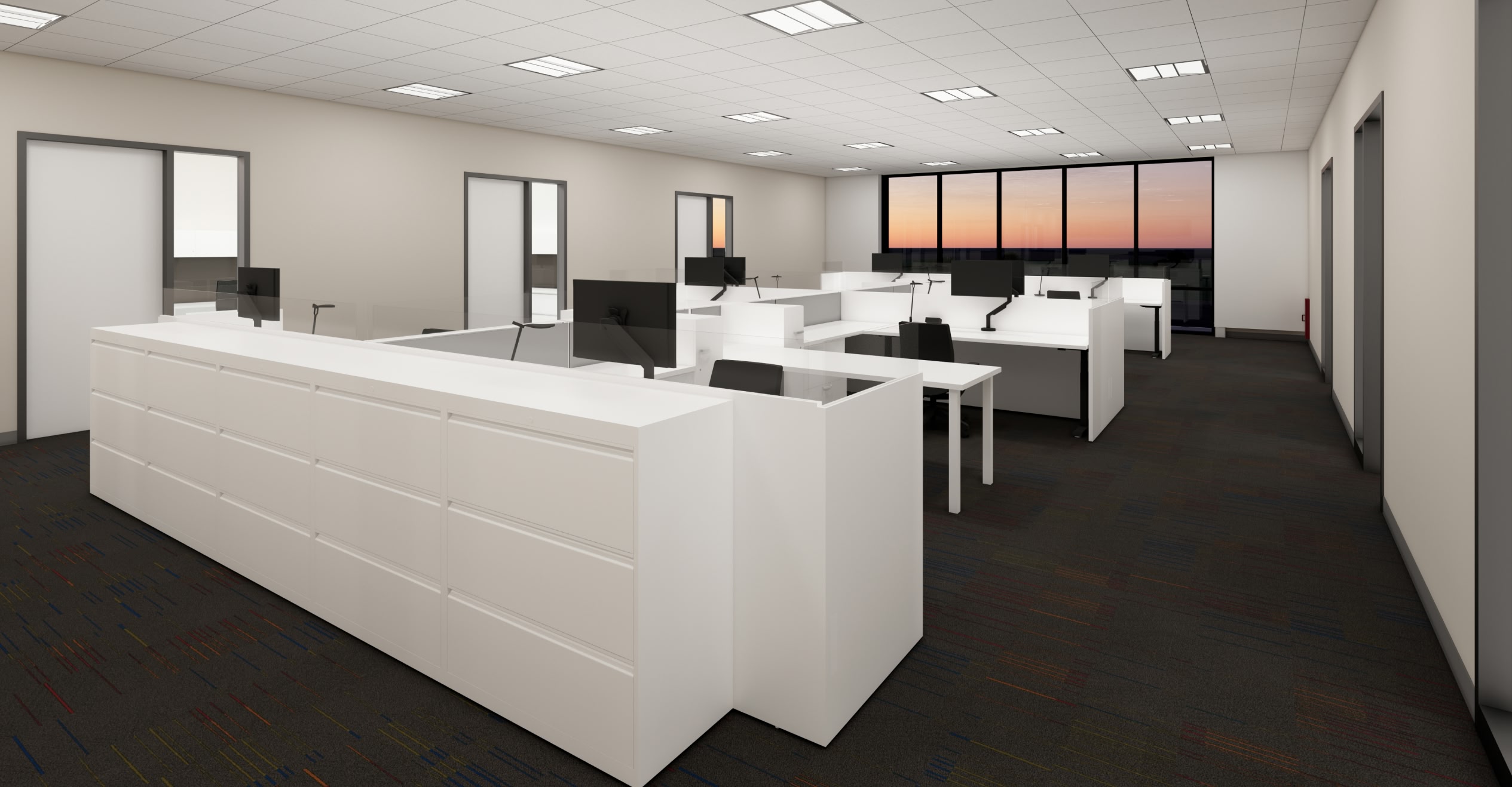 Modern office interior with rows of white desks and black chairs. Computers on desks.