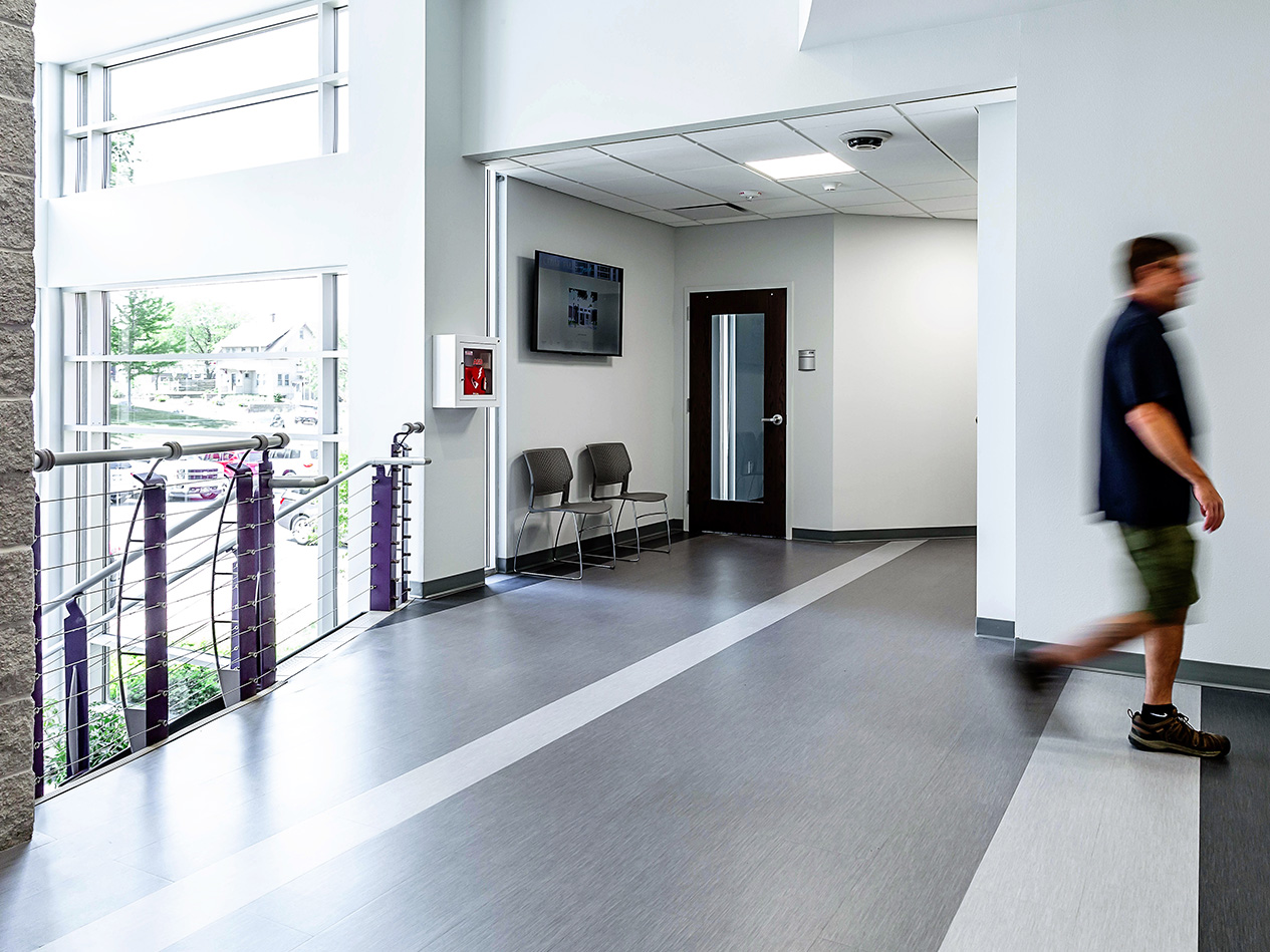 Cedar Falls City Hall interior corridor with improved accessibility and modern finishes.