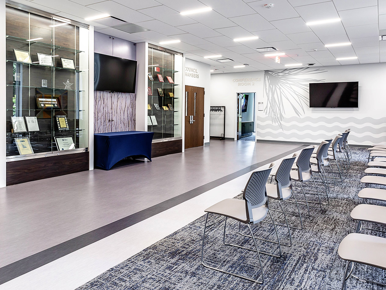 View of Cedar Falls City Hall interior showing lobby seating and improved circulation paths.