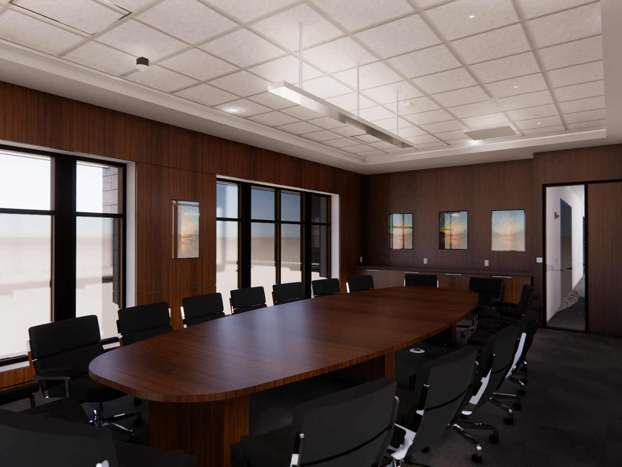 Conference room inside the City of Cedar Rapids Annex Building with large meeting table, seating, and windows that support collaborative interdepartmental meetings.