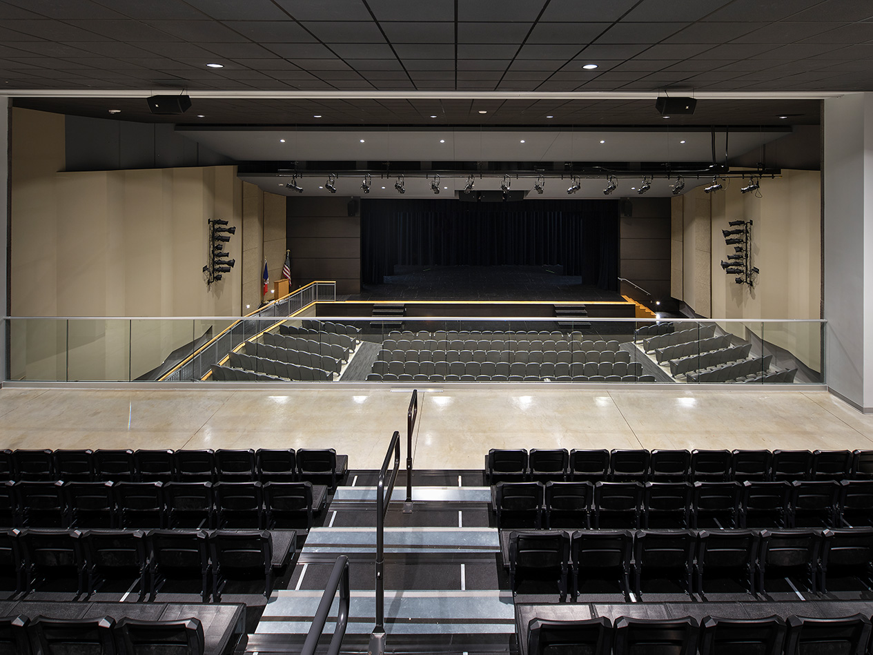 Auditorium seating designed for school assemblies, performances, and community events.