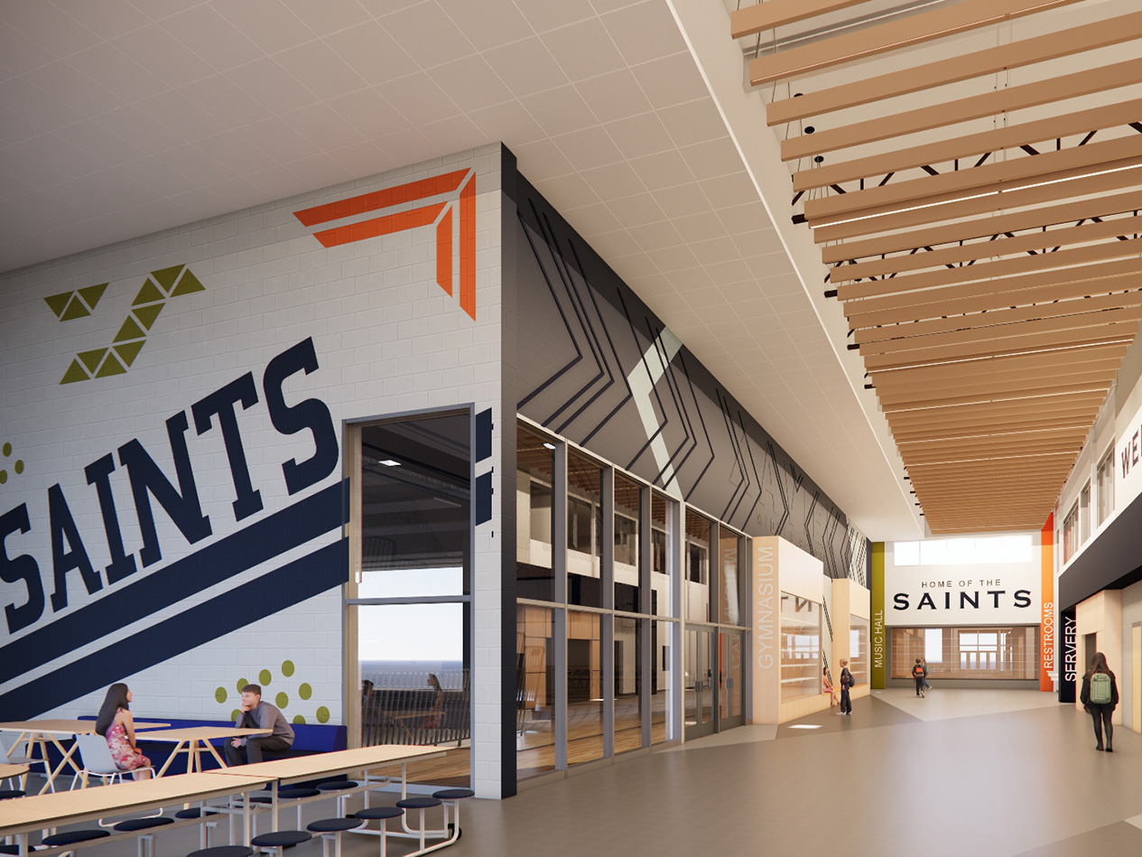 Xavier Middle School adaptive reuse commons area with collaborative seating and natural light