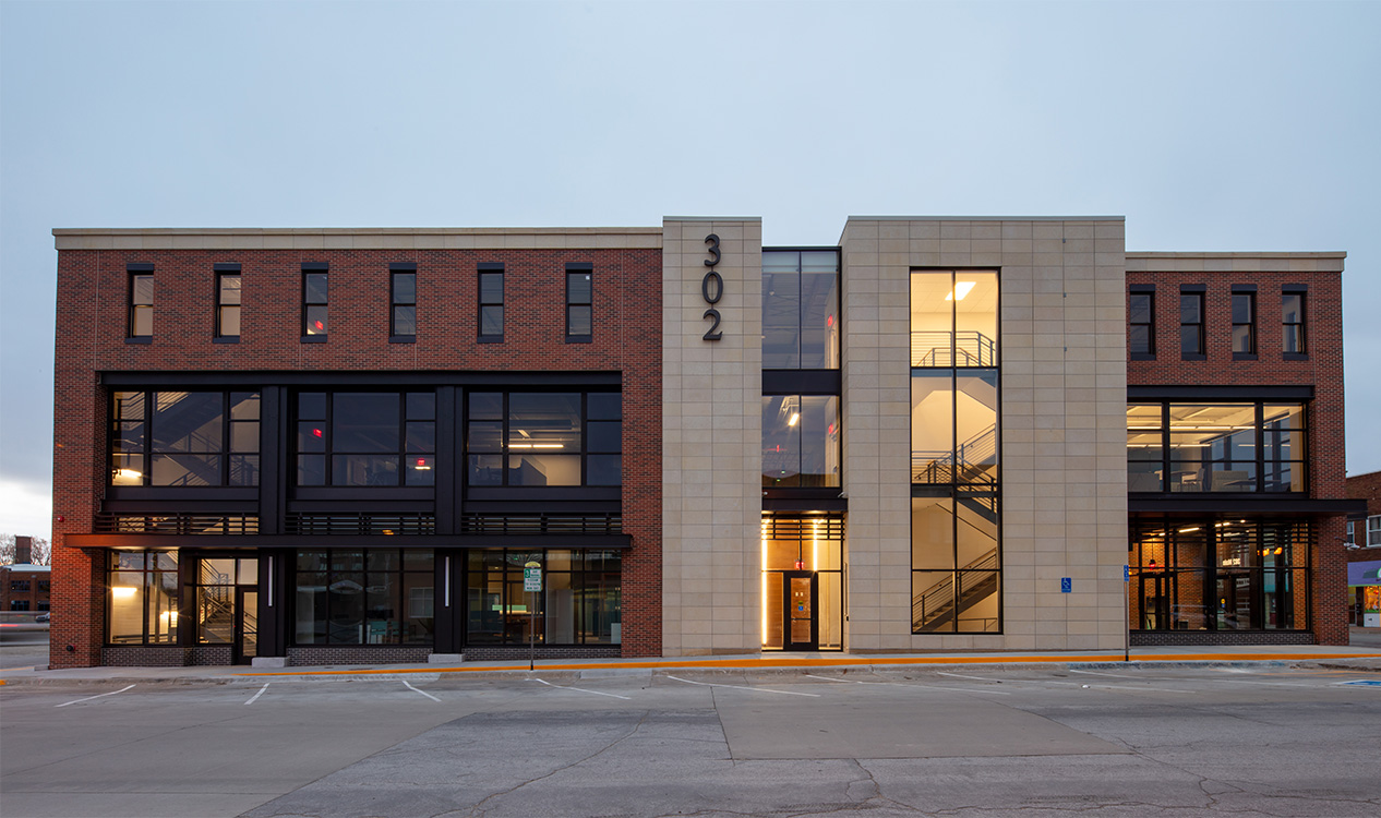 Front exterior of the 302 Main Street Building, a mixed-use commercial development in downtown Cedar Falls, Iowa.