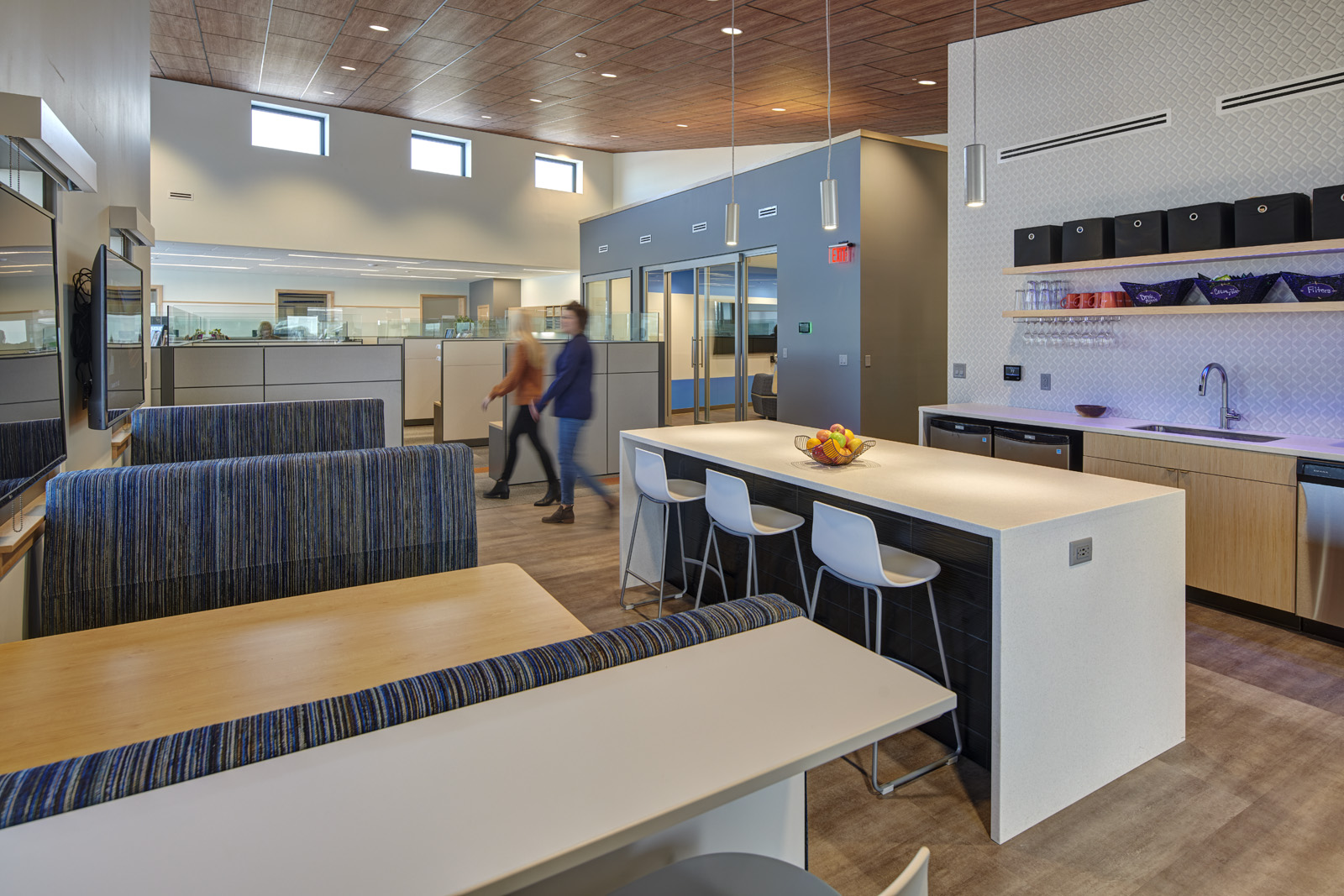 Break room with seating options and shared amenities.