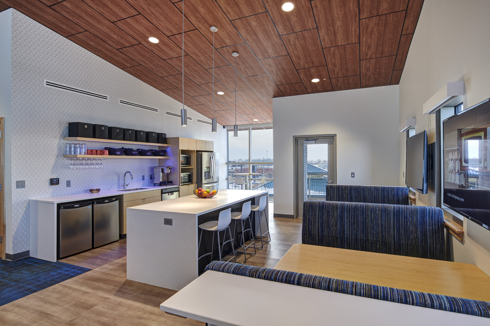 Employee café and kitchen designed for gathering and connection.