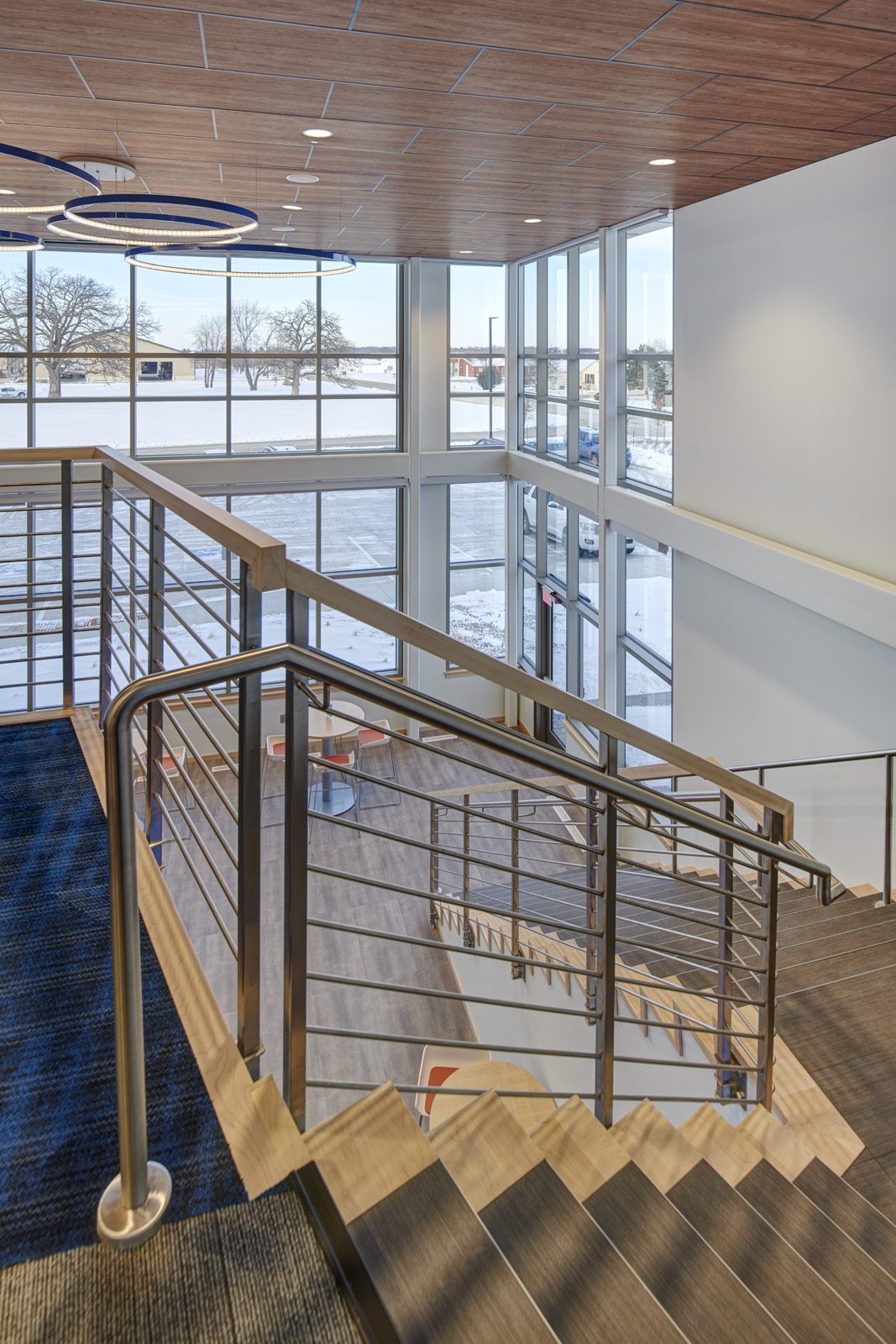 Stair and mezzanine connecting collaborative workplace environments.
