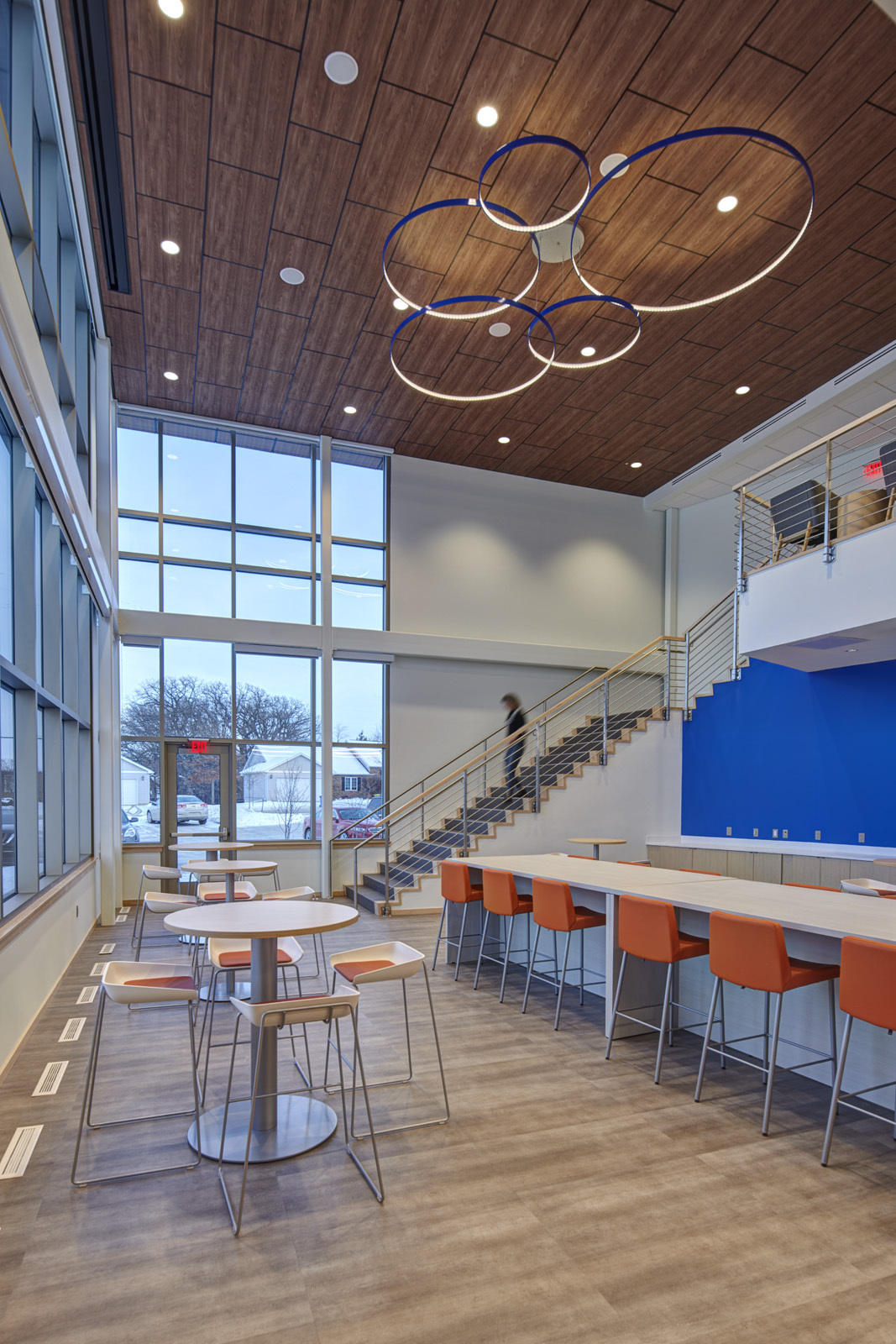Open stair connecting multiple levels within The Accel Group headquarters.