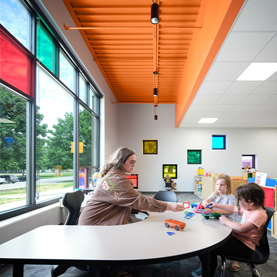 Bright classroom in the Riceville Daycare Addition with large windows and colorful learning spaces