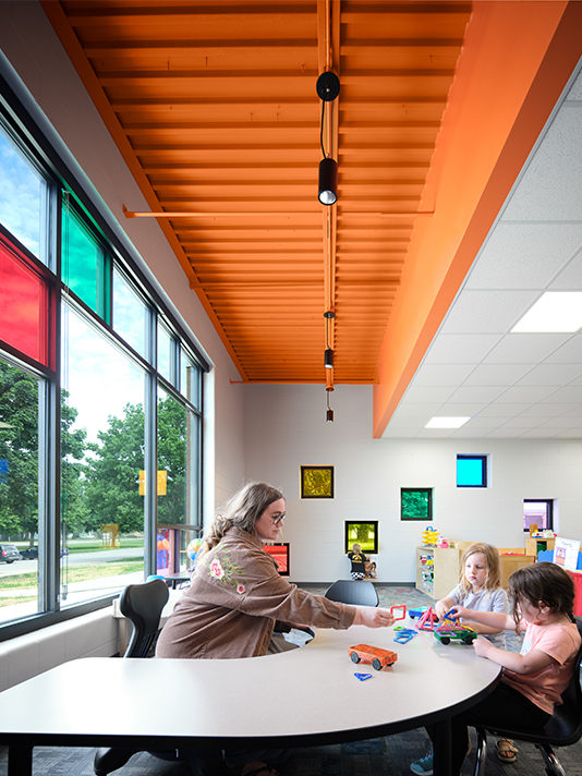 Teacher and children learning together in a Riceville Daycare Addition classroom