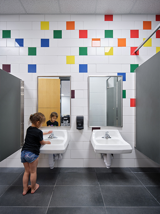 Colorful restroom designed for early childhood students in the Riceville Daycare Addition